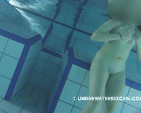 NEW! Because she saw my hard big cock, this busty teen girl gets horny and tries to see him underwater.