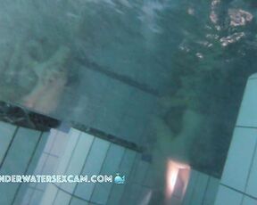NEW! A couple is doing something underwater, and the husband of the other woman next to them gets an erection from watching.