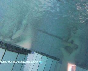 NEW! A couple is doing something underwater, and the husband of the other woman next to them gets an erection from watching.