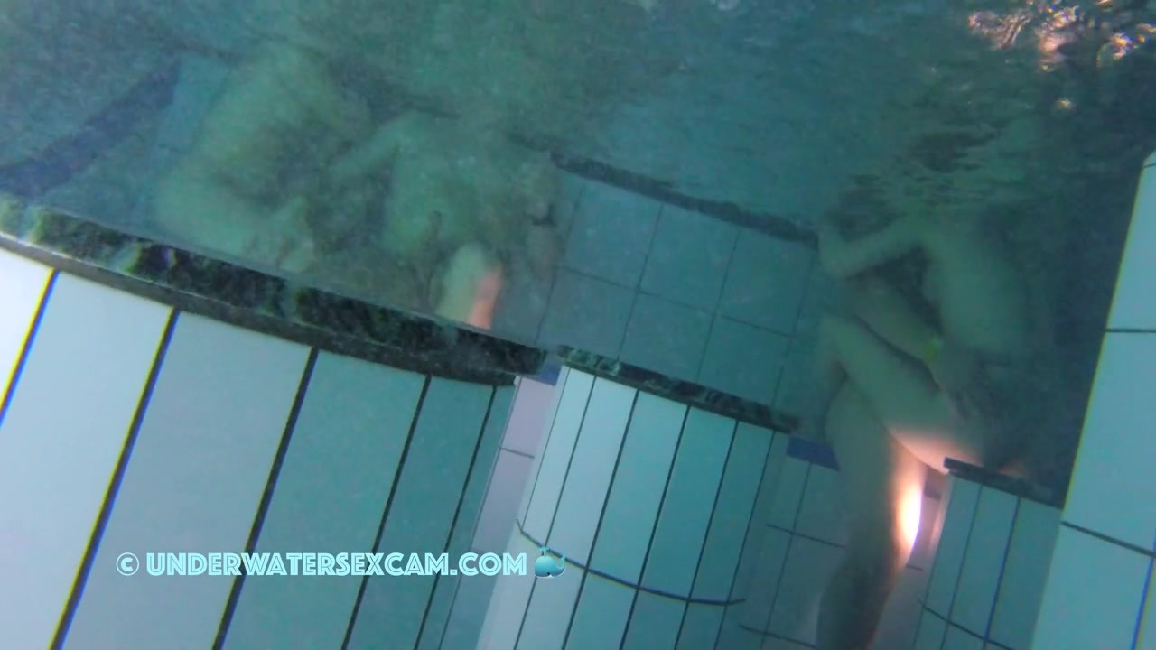 NEW! A couple is doing something underwater, and the husband of the other woman next to them gets an erection from watching.