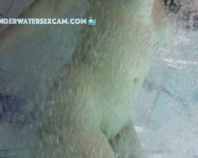 NEW! This young girl discovered the floor bubbler in the sauna pool and uses it to masturbate.