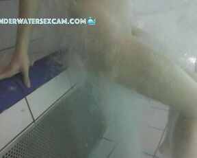NEW! This young girl discovered the floor bubbler in the sauna pool and uses it to masturbate.