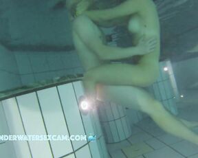 NEW! She's moving up and down! Maybe they're training for their first real underwater fuck.