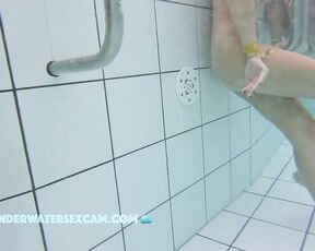 NEW! This hot teen girl also gets horny because she is naked in the warm water of the pool and many men are staring at her.