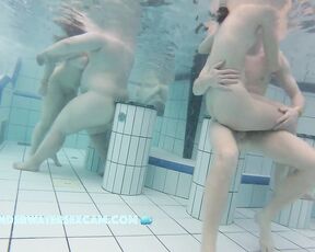 NEW! This young couple seems to be really enjoying themselves in the warm water of the pool