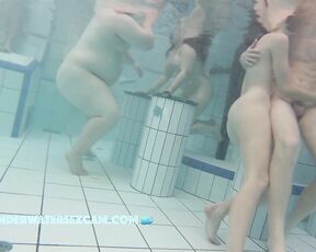 NEW! This young couple seems to be really enjoying themselves in the warm water of the pool