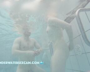 NEW! So I guess he doesn't even noticed how she's pleasuring herself with the underwater jet