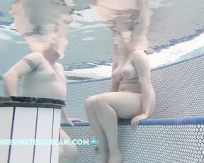 NEW! I don't know what that young woman with the big breasts wants with that old man, but he likes her boobs