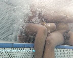 NEW! She's so horny, she'd definitely fuck me in the jacuzzi if she were alone while the voyeur's hidden camera is taping them underwater in a public nudist resort.