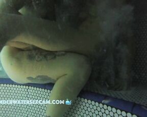 NEW! The two young lesbians have no problem at all fingering each other in front of the other people in the hot tub