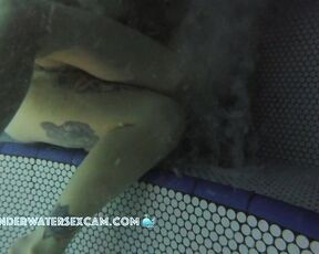 NEW! The two young lesbians have no problem at all fingering each other in front of the other people in the hot tub