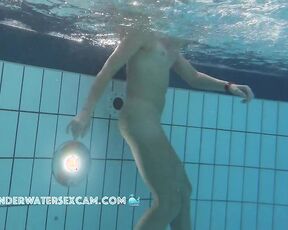NEW! This very athletic and slender girl loves to move around in the water