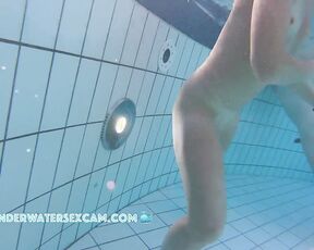 NEW! This very athletic and slender girl loves to move around in the water