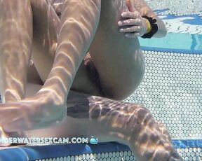 NEW! I've looked at her pussy a few times now, and I'm still not sure if that's her clitoris sticking out