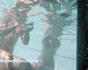 NEW! This cute couple just stuck their arms out of the water, which, admittedly, looks pretty funny from this angle