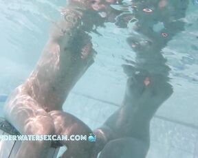 NEW! This cute couple just stuck their arms out of the water, which, admittedly, looks pretty funny from this angle