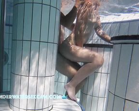 NEW! This young couple is so horny and is having sex in the crowded sauna pool, and she's also using her fingers