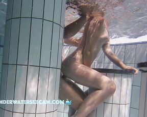 NEW! This young couple is so horny and is having sex in the crowded sauna pool, and she's also using her fingers
