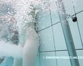 NEW! She's letting that super-powerful underwater jet really fuck her pussy, and everyone can see it! You too ;-)