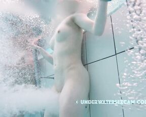NEW! She's letting that super-powerful underwater jet really fuck her pussy, and everyone can see it! You too ;-)