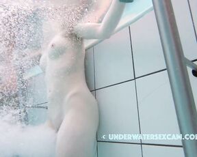 NEW! She's letting that super-powerful underwater jet really fuck her pussy, and everyone can see it! You too ;-)