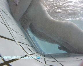 NEW! I was hoping she'd masturbate on the underwater lounger, but instead her boyfriend is doing it