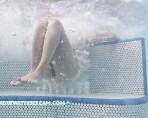 NEW! She loves having her pussy and her extremely long legs massaged by the bubbles in the hot tub