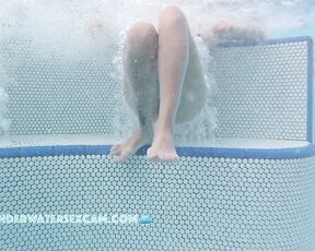 NEW! She loves having her pussy and her extremely long legs massaged by the bubbles in the hot tub