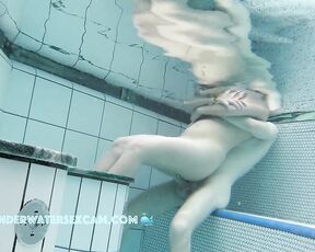 NEW! How on earth do you fit such a big dick into such a tiny pussy—and in the water, too? ;-)