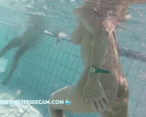 NEW! While this MILF moves quickly and runs away, the horny voyeur films her with his underwater spy cam at a nudist resort