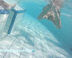 NEW! While this MILF moves quickly and runs away, the horny voyeur films her with his underwater spy cam at a nudist resort