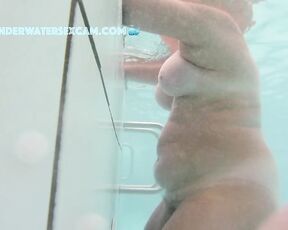 NEW! Masturbating with the underwater jet really messes up her pubic hair!