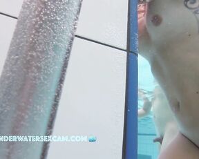 NEW! As she watches the other naked people, she gets turned on and crosses her legs to turn herself on even more.