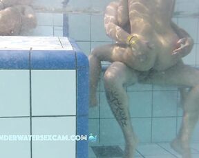 NEW! Even though the sauna pool is packed with people, no one notices that this young couple is really having sex.