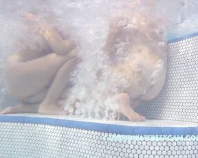 NEW! Some girls in the hot tub prefer to sit like that—maybe because it gives their pussies a better massage?